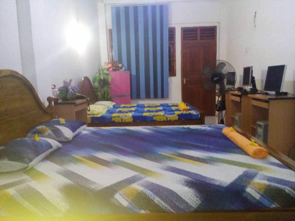 Smart Holiday Inn Galle Quarto foto